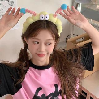 ของแต่งกายแบบน่ารักและตลก พร้อมดีไซน์ตาโตที่บิดได้ และสายคาดศีรษะสำหรับตกแต่ง