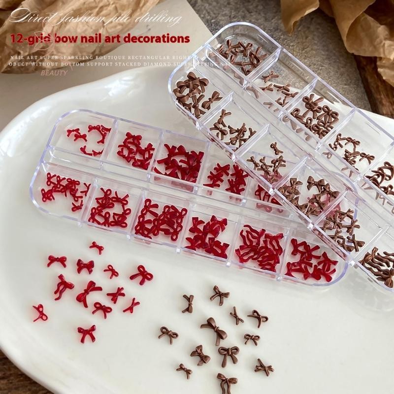 [maybeauty] 12 กริด/กล่องโบว์ตกแต่งเล็บ 3d สีแดงสีน้ําตาล Bowknot เรซิ่น Charms เครื่องประดับ Diy ตกแต่งเล็บอุปกรณ์ {TH}
