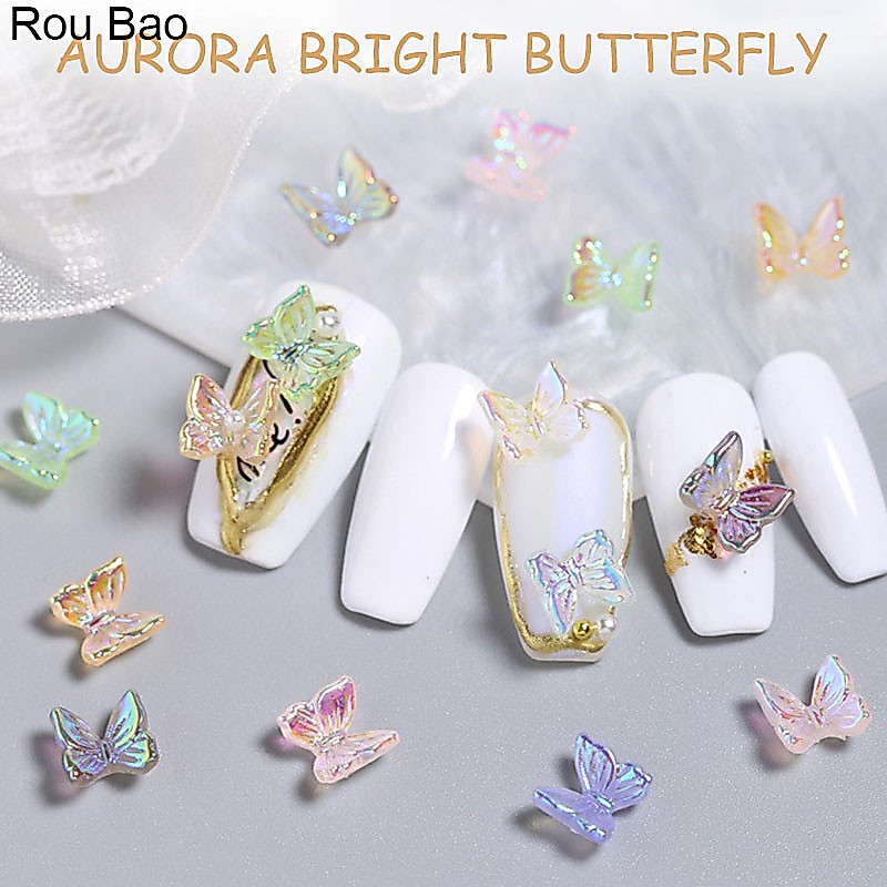 Rou Bao อุปกรณ์ตกแต่งเล็บเรซิ่น ไล่โทนสี รูปผีเสื้อ 3D ขนาดเล็ก หลากสี สําหรับตกแต่งเล็บ DIY 50 ชิ้น