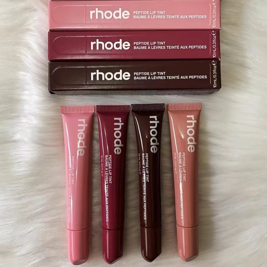 ลิปสติก Rhode Hailey Peptide ลิปบาล์มบำรุงริมฝีปาก ลิปบาล์มมีสี ราสเบอร์รี่ ริบบอน โทสต์ เอสเพรสโซ ลิปกลอส ลิปกลอส