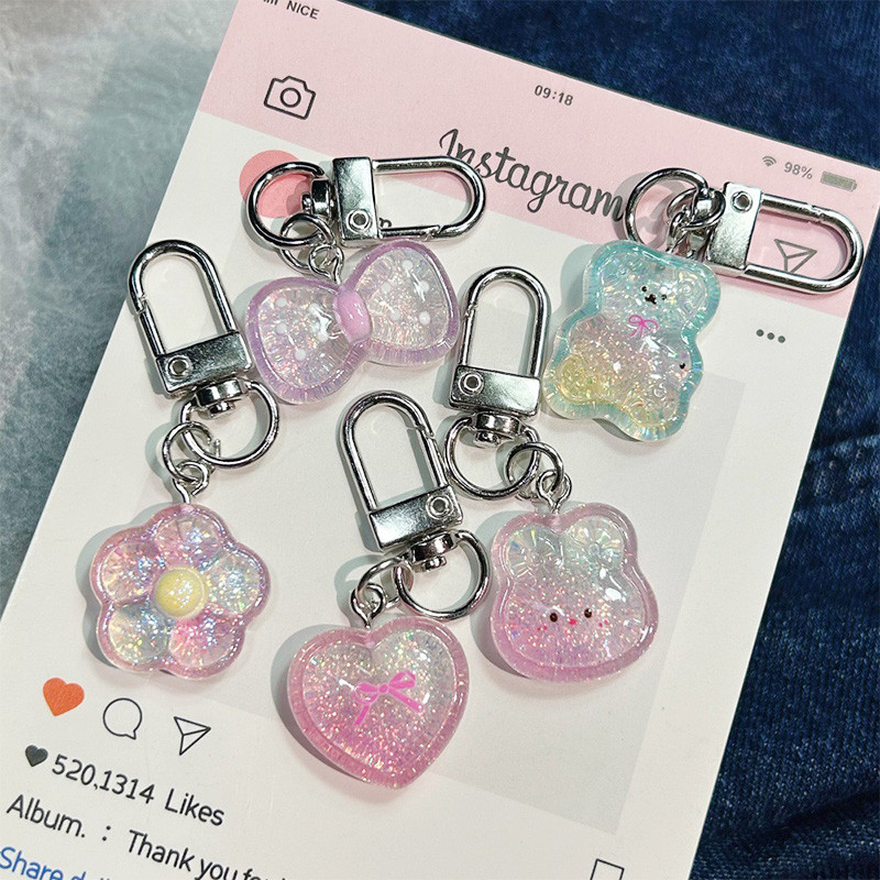 น่ารักการ์ตูนเลเซอร์กึ่งโปร่งแสงขนาดเล็กหมีเงินพวงกุญแจกุทัณฑ์หัวใจกระต่ายกระเป๋าอุปกรณ์เสริมหูฟังกรณีตกแต่ง