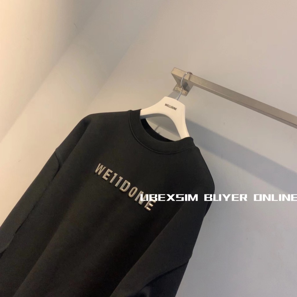 เสื้อสเวตเตอร์แขนยาวโลโก้ซีลเหล็ก WE11DONE