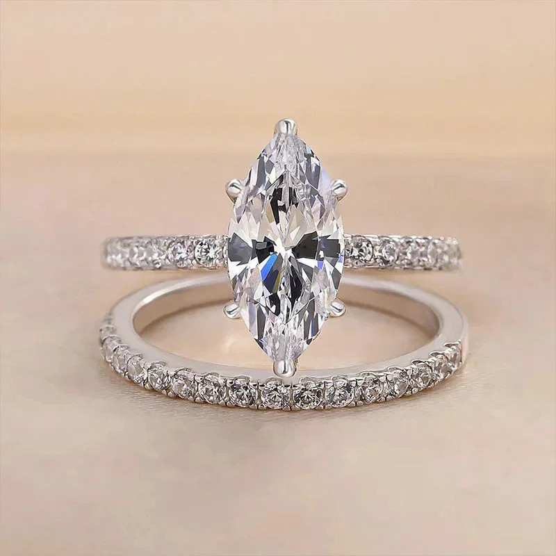 แฟชั่น 925 เงินสเตอร์ลิงประณีตคริสตัล Marquise Cubic Zirconia ชุดแหวนผู้หญิงสําหรับงานแต่งงานหรูหราอินเทรนด์แหวนหญิง 2 ชิ้นชุดเครื่องประดับ