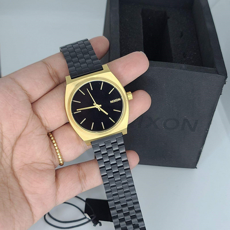 ของแท้ Nixon Nixon นาฬิกาแฟชั่นสายเหล็กเงินสีเขียวขนาดเล็กสด Simple Square Unisex ผู้ชายผู้หญิงนาฬิก