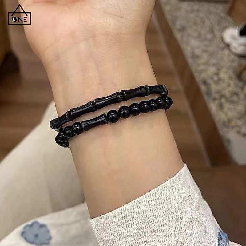 COD❤️สร้อยข้อมือลูกปัดไม้ไผ่สีดำสไตล์จีนแฟชั่นระดับไฮเอนด์เครื่องประดับสำหรับผู้ชายและผู้หญิง-a.one