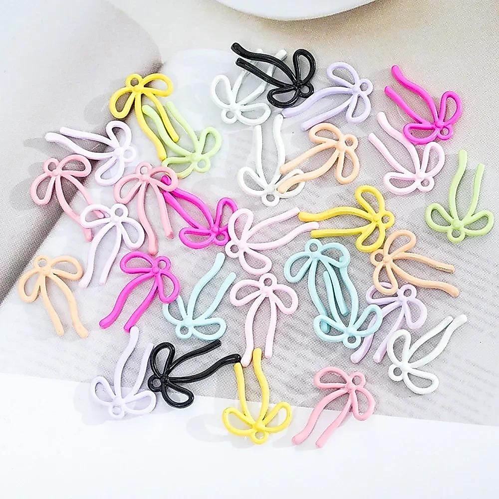 10 ชิ้นขายส่งโลหะ Hollow Bow Tie Charms จี้สําหรับต่างหูสร้อยคอเครื่องประดับทํา DIY Handmade Craft