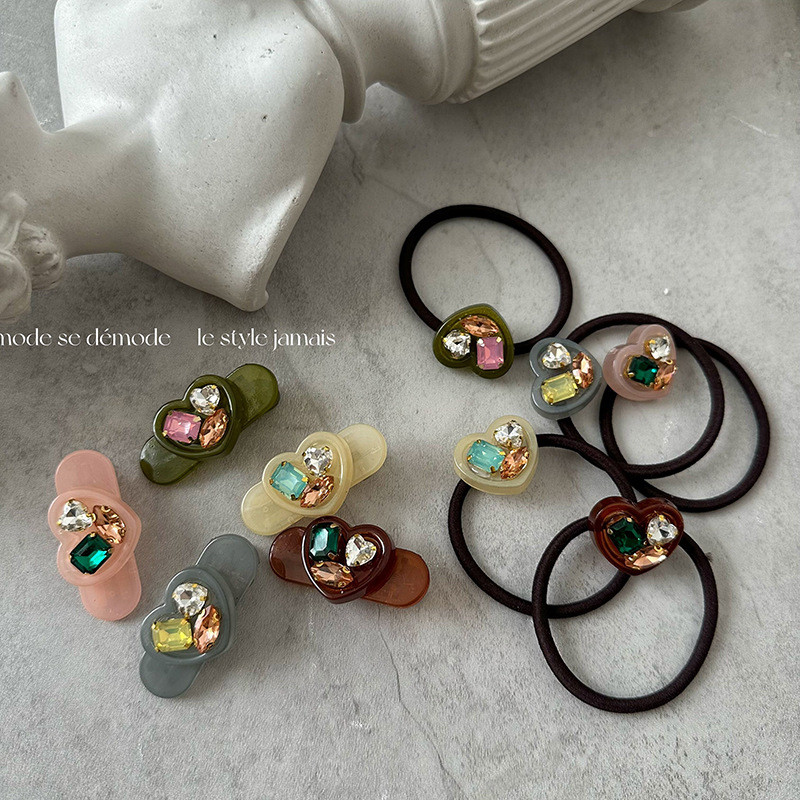 เวอร์ชั่นเกาหลีแฟชั่นอารมณ์รัก พลอยเทียม ผมแหวนสาวหัวใจสี พลอยเทียม เชือกผมหางม้ายางรัดสไตล์ใหม่