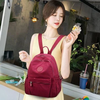 แฟชั่นผู้หญิงใหม่กระเป๋าเป้สะพายหลังไนลอน Candy สีทึบอินเทรนด์ Casual อเนกประสงค์ช้อปปิ้ง Mommy Bag