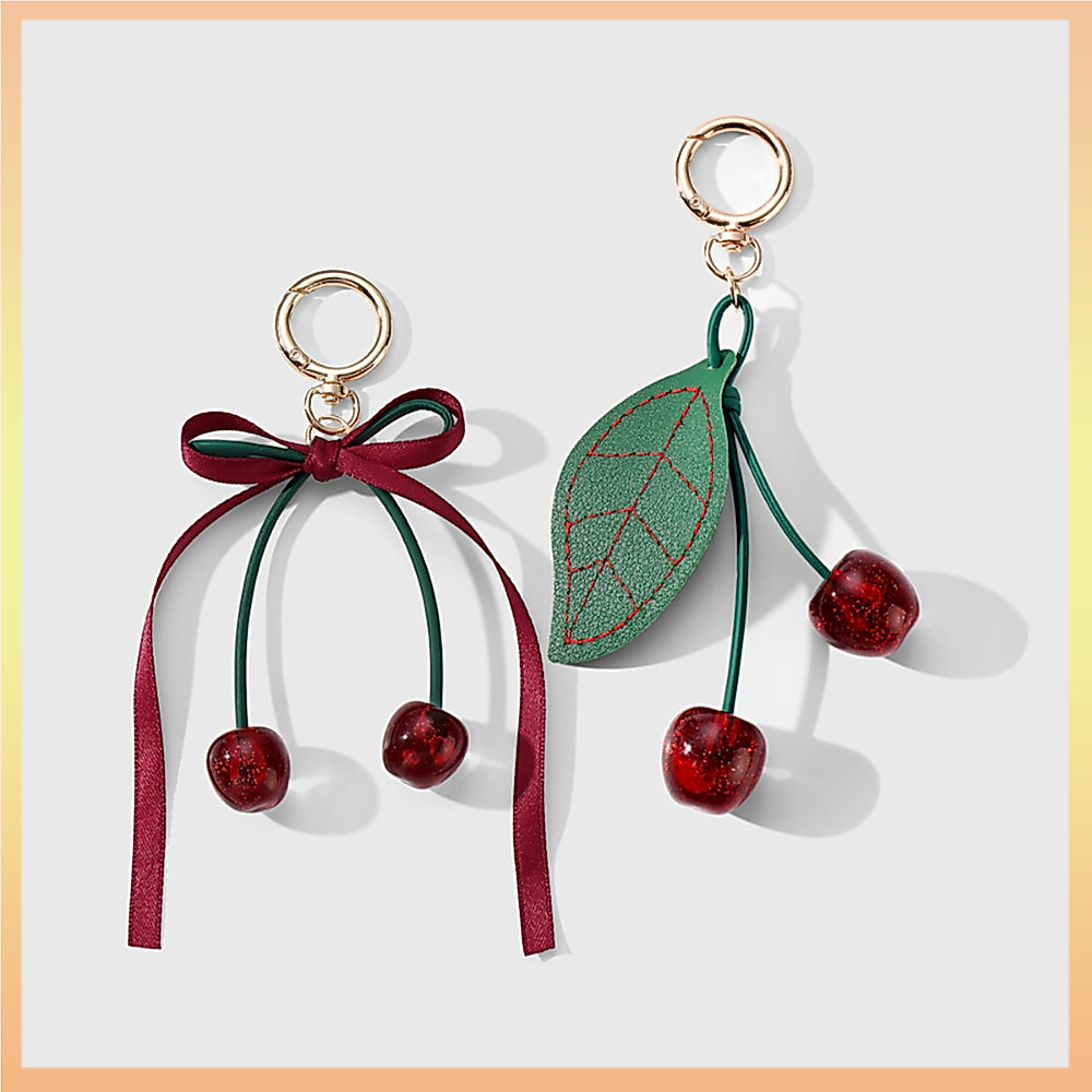 Sweet Glitter Cherry Key แหวนประณีต Cherry กระเป๋าจี้ที่ไม่ซ้ํากันคุณภาพสูงหนังจําลอง Leaf พวงกุญแจสําหรับโทรศัพท์ Lanyard พวงกุญแจของขวัญสําหรับเพื่อน