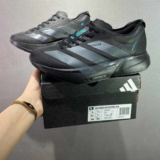 Adizero Adios Pro 4 รองเท้าวิ่งสำหรับผู้ชายและผู้หญิง ด้วยแผ่นคาร์บอนเทคโนโลยี EVO SL HQ7411 ZOGZ