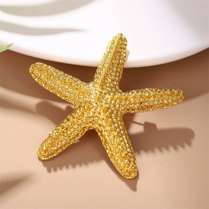 1 PC Retro ปลาดาวเข็มกลัดสําหรับผู้หญิงผู้ชายน่ารัก Sea Star ฝังเพทายเข็มกลัด Pins เครื่องประดับอุปกรณ์เสริมของขวัญ 2025 แนวโน้ม
