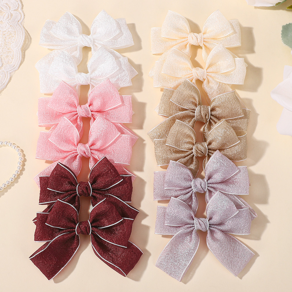 เซ็ตbowและclipสำหรับเด็ก 2ชิ้น สีชมพูน่ารัก เหมาะสำหรับเจ้าหญิง صغيرة
