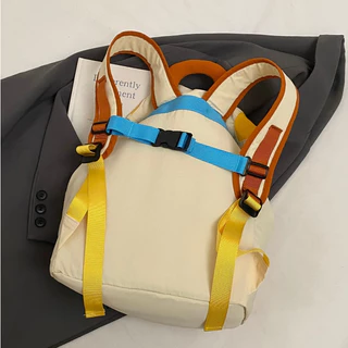 (ส่งด่วน)xspeedfashion(X2487) กระเป๋าเป้สีครีม-เหลืองเขียว ด้านหน้ามี2ช่องใส่ของ