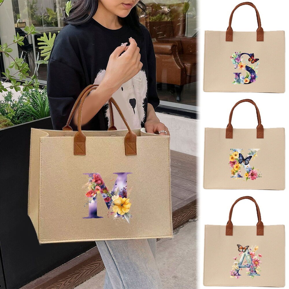กระเป๋าผ้าสักหลาดสีขาว กระเป๋าถือแบบโท้ท กระเป๋าช้อปปิ้งแบบถือ กระเป๋าถือสำหรับผู้หญิง พิมพ์ลายผีเสื้อและตัวอักษร
