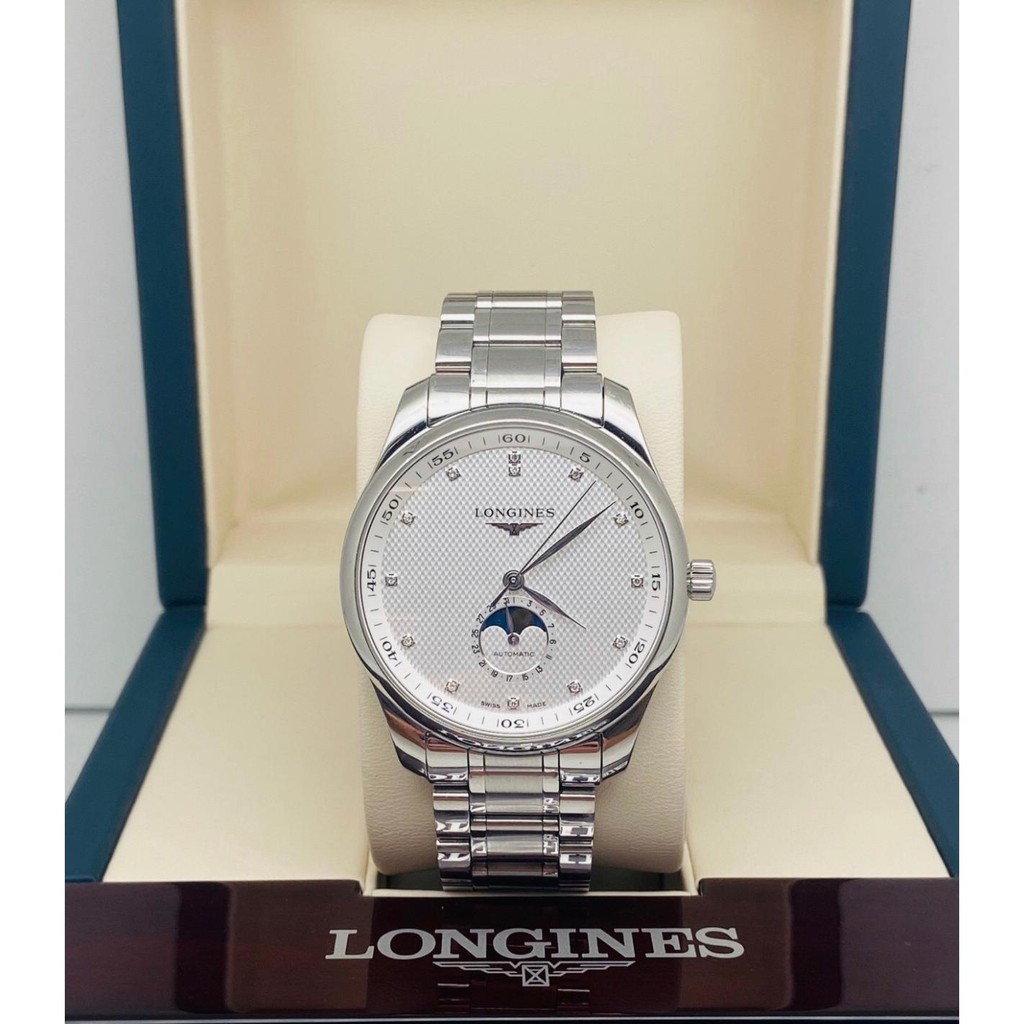 LL. Longinesees ช่างฝีมือที่มีชื่อเสียงอัตโนมัติไขลานนาฬิกาผู้ชาย L2.909.4.77.6 มิถุนายนเฟสเพชรแกะสล