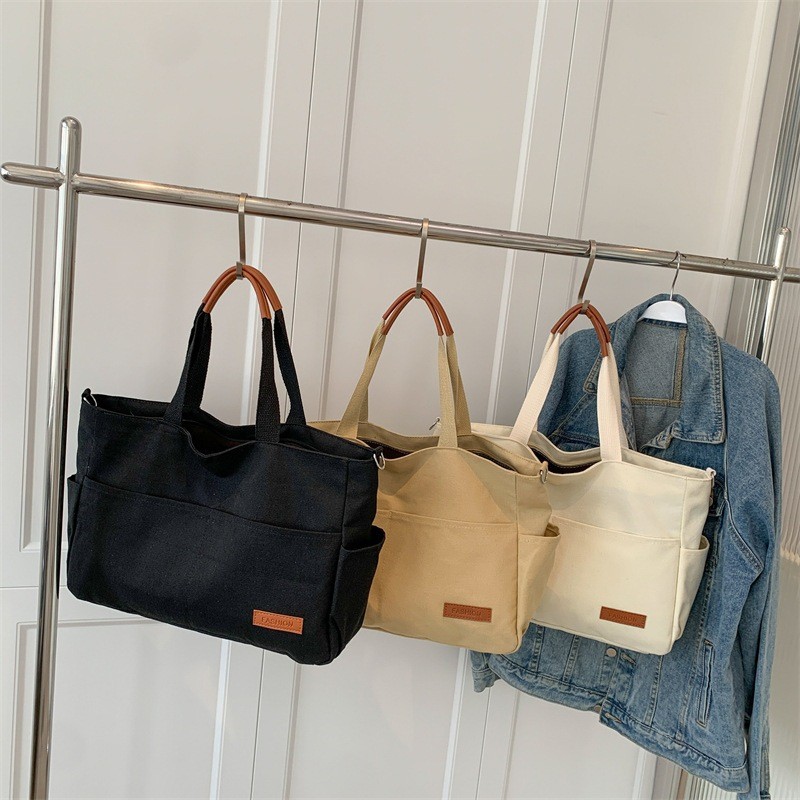 JNK #7332 กระเป๋าโทท์สไตล์มินิมอล ความเป็นมิตรของชุดใดๆ