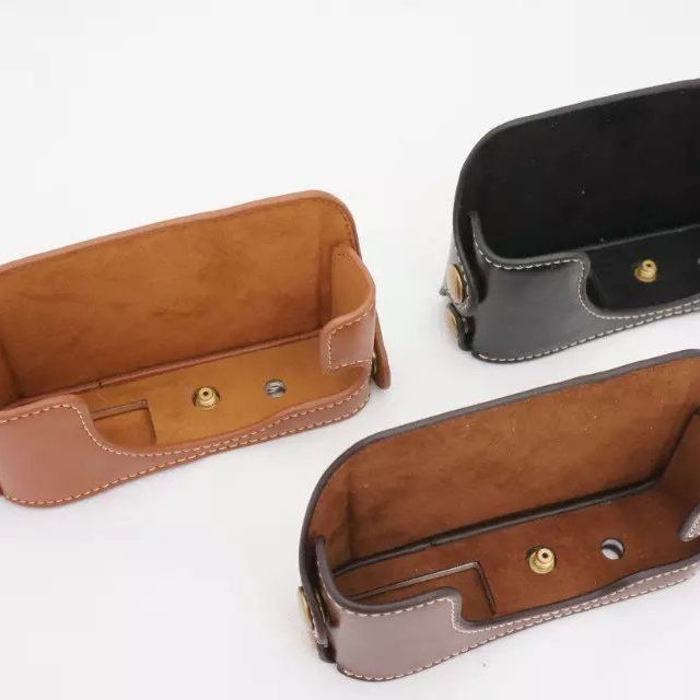 เหมาะสําหรับ Sony RX1 กระเป๋ากล้องหนัง RX1R เคสป้องกัน RX1RII กล้อง RX1R2 Handle ครึ่งกรณี hw01