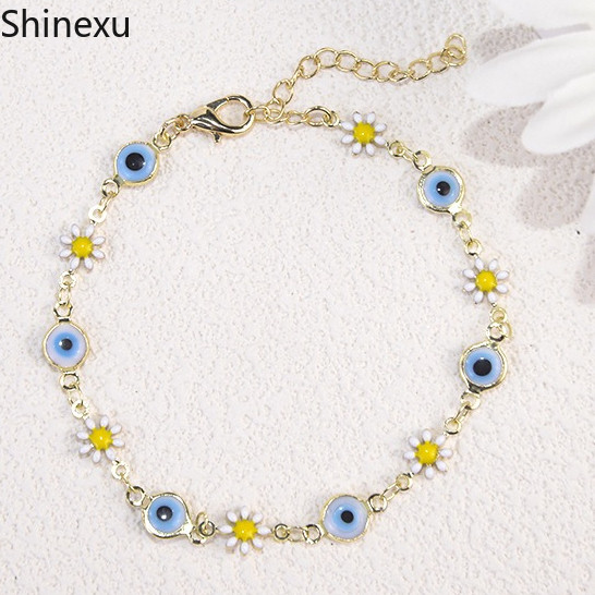 Shinexu สร้อยข้อมือสำหรับผู้หญิง Retro Daisy และดอกทานตะวัน สีฟ้า vintage เหมาะเป็นของขวัญ