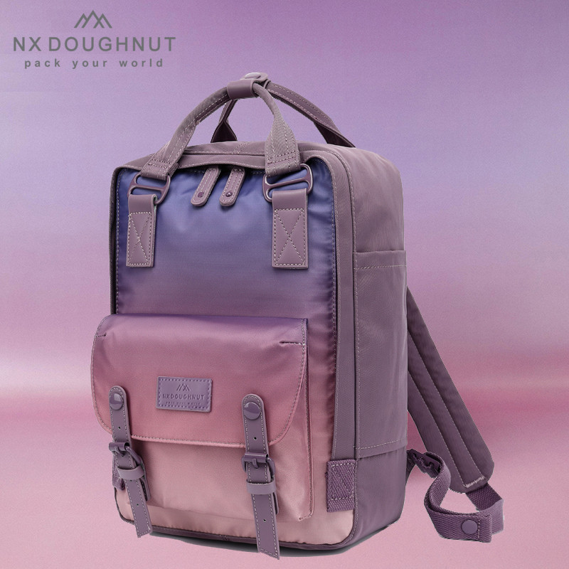 NX Donut ของแท้ Donut Travel กระเป๋าเป้สะพายหลังนักเรียนกระเป๋าเป้สะพายหลังหญิง Sky Series กระเป๋าคอ