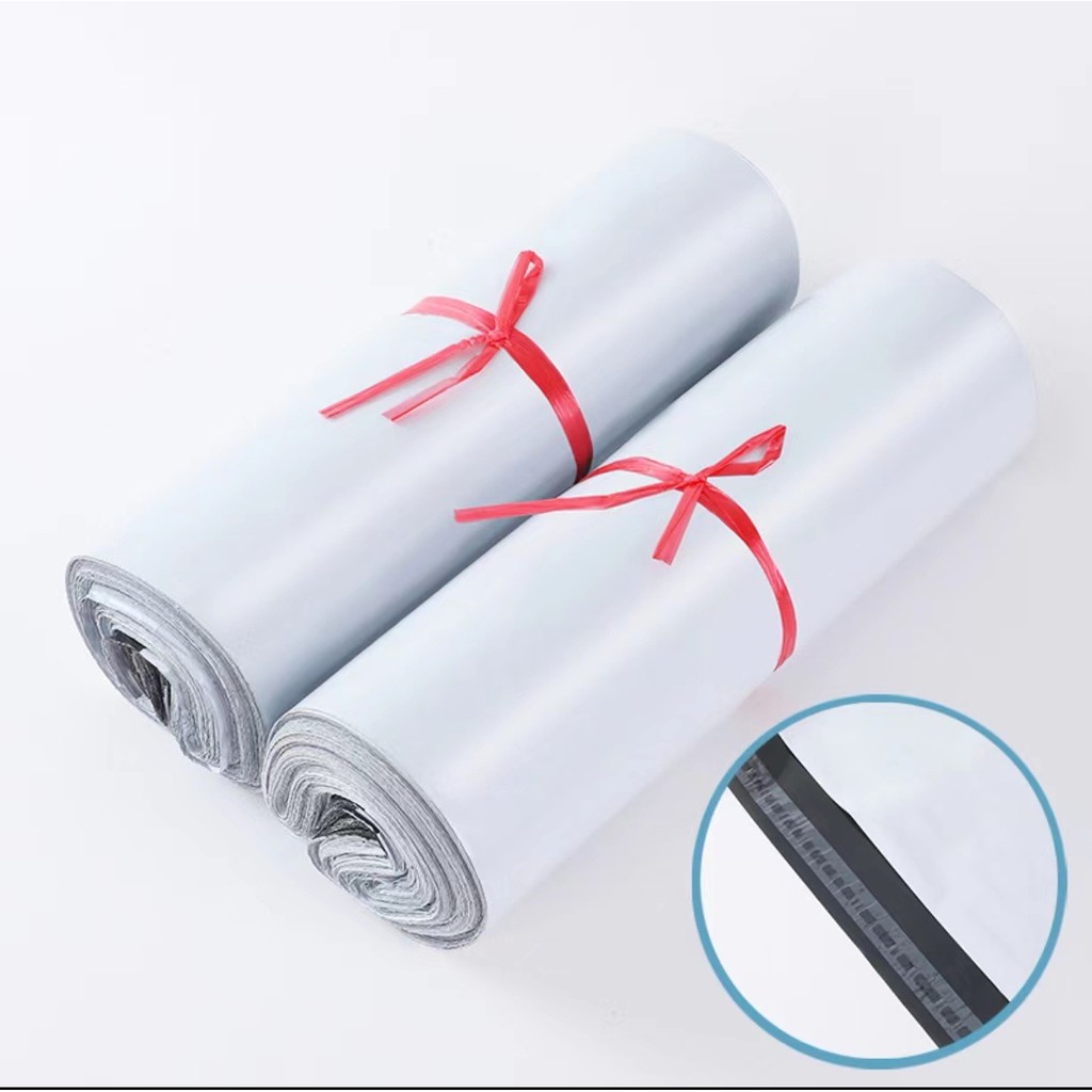 วัสดุใหม่หนา Courier กระเป๋าบรรจุเทป 12 ผ้าไหมเสื้อผ้าโลจิสติกบรรจุภัณฑ์ Taobao สีดําสีขาว