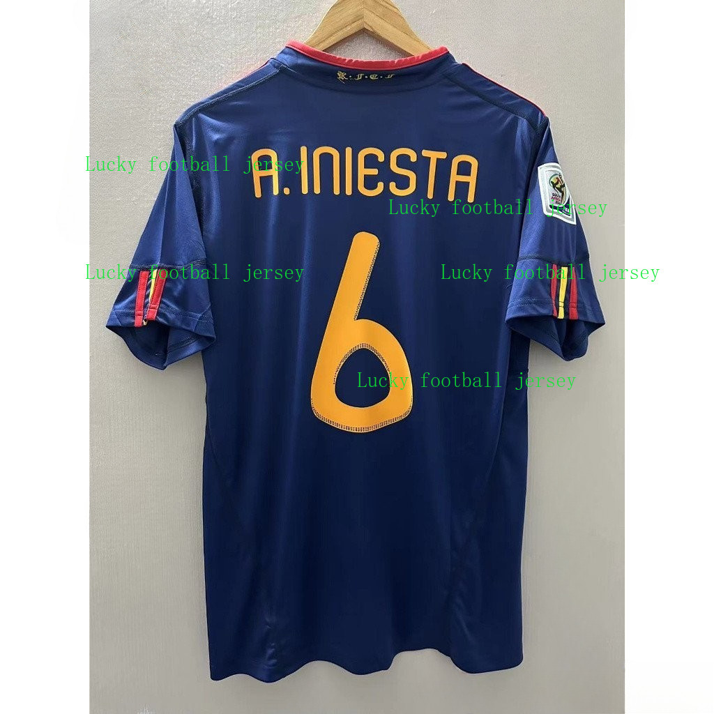เสื้อฟุตบอล retro แบบห่างของสเปนปี 2010 คุณภาพสูงINIESTA VAAG