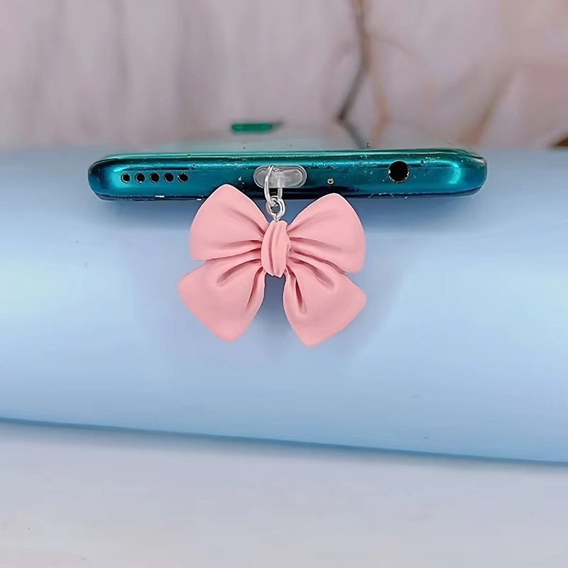 SAMSUNG 1ชิ้นน่ารักสีชมพูโบว์โทรศัพท์ฝุ่นเสียบอุปกรณ์เสริมตกแต่งแขวนจี้สําหรับ ไอโฟน สําหรับ ซัมซุง พิมพ์-ค ชาร์จพอร์ต