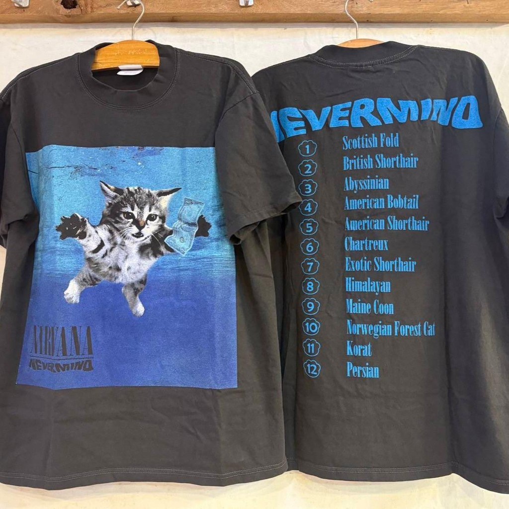 เสื้อลาย เนอวาน่าแมวเก็บแบงค์สีเฟด Nirvana Cat Nevermind ( ป้าย Hanes )