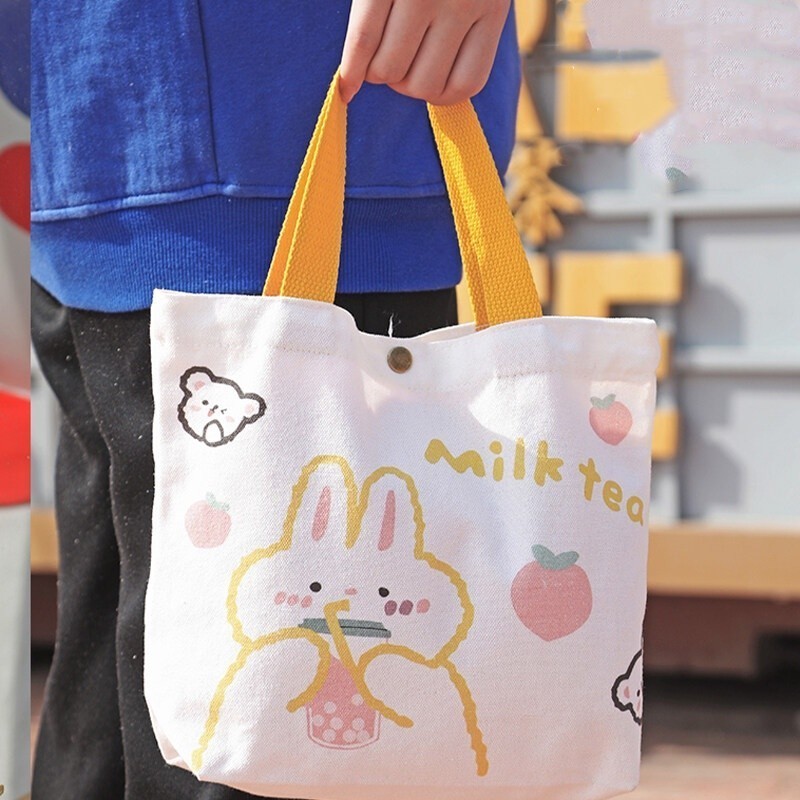 CMUSIC กระเป๋าถือ กระเป๋าผ้า กระเป๋าช้อปปิ้งขนาดใหญ่ ลายการ์ตูนจุของได้เยอะ เหมาะสำหรับนักเรียนและสุภาพสตรี - รูปที่ 6