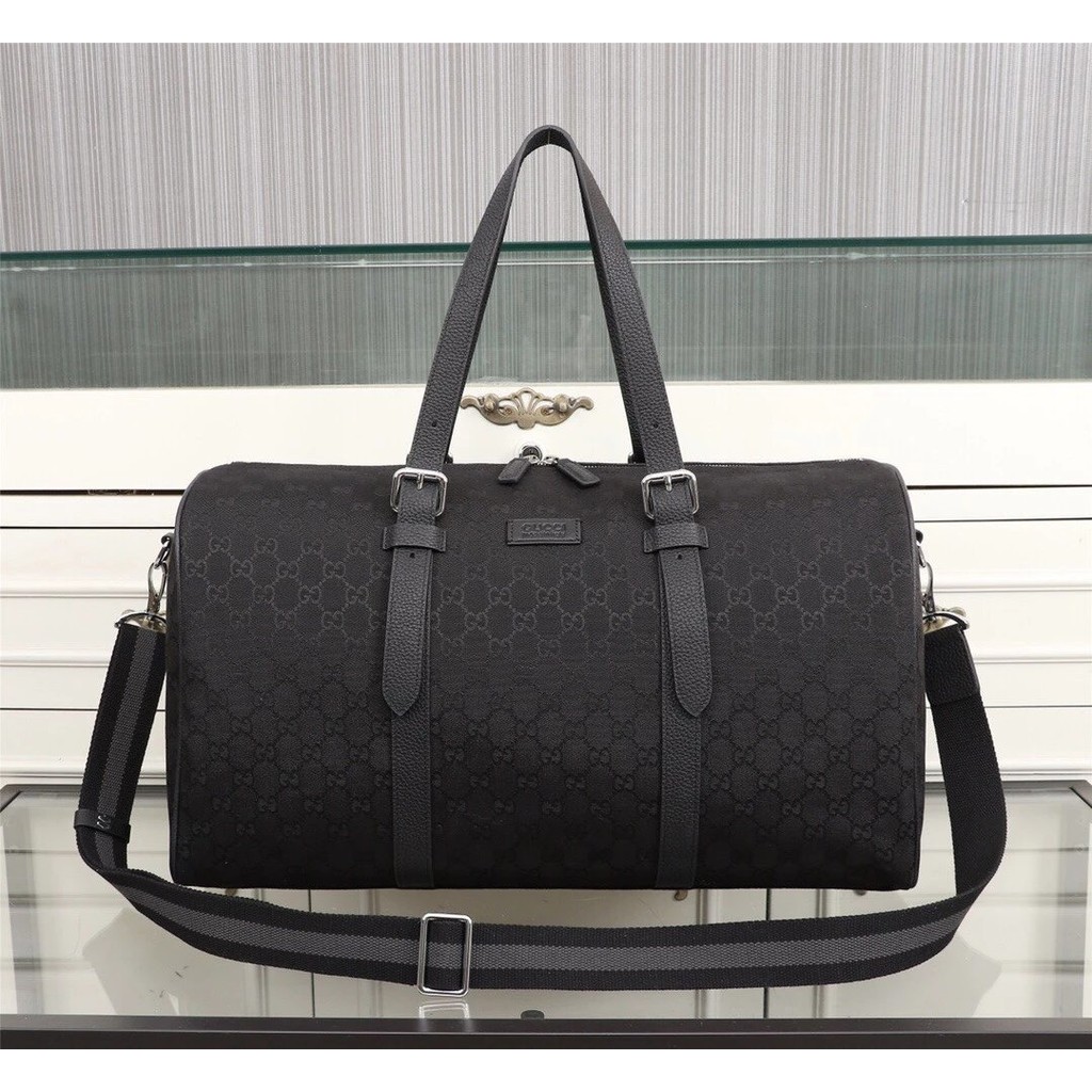 CUCCI (Gucci) สินค้ามาใหม่ใช้ผ้านําเข้าเพื่อทํากระเป๋าเดินทางความจุขนาดใหญ่ดีไซน์สดใสความงามที่ไม่ซ้