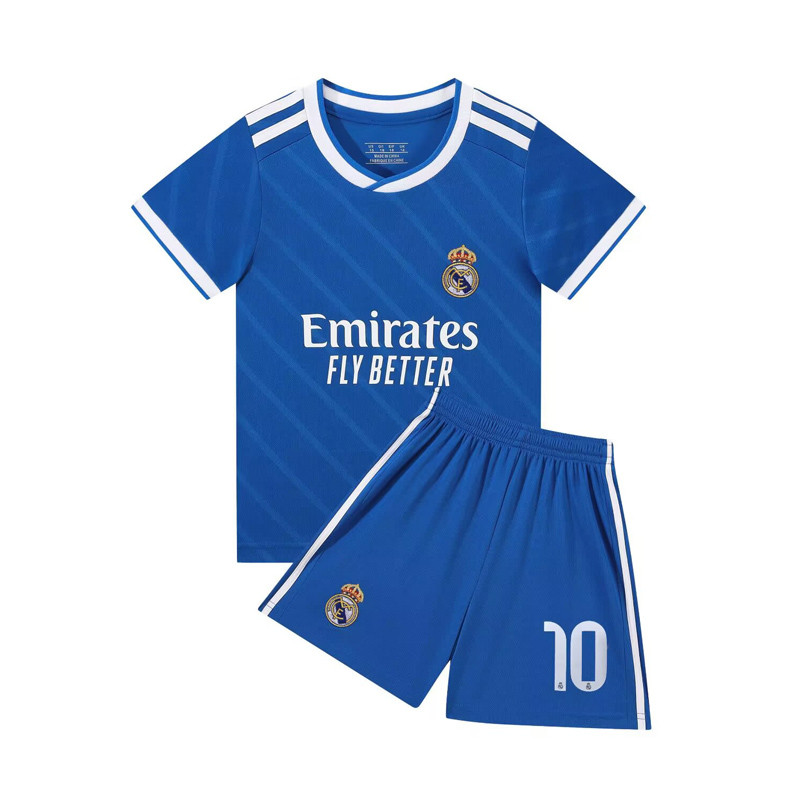 ใหม่ล่าสุด 2025/26 ชุดเสื้อฟุตบอลเด็ก MBAPPE VINI JR. BELLINGHAM Blue Tops+กางเกงขาสั้นชุดกีฬาสําหรับเด็กผู้หญิง 2-15 ปี