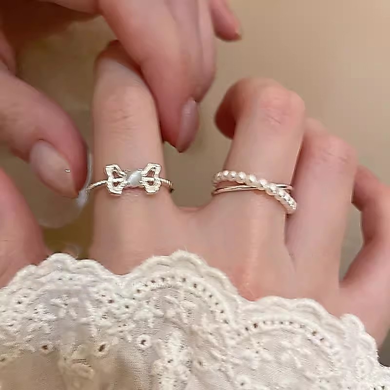 เกาหลีแมวตาหินโบว ์ เปิดแหวนมุกหญิงสีเงินปรับของขวัญวันเกิดนักเรียน