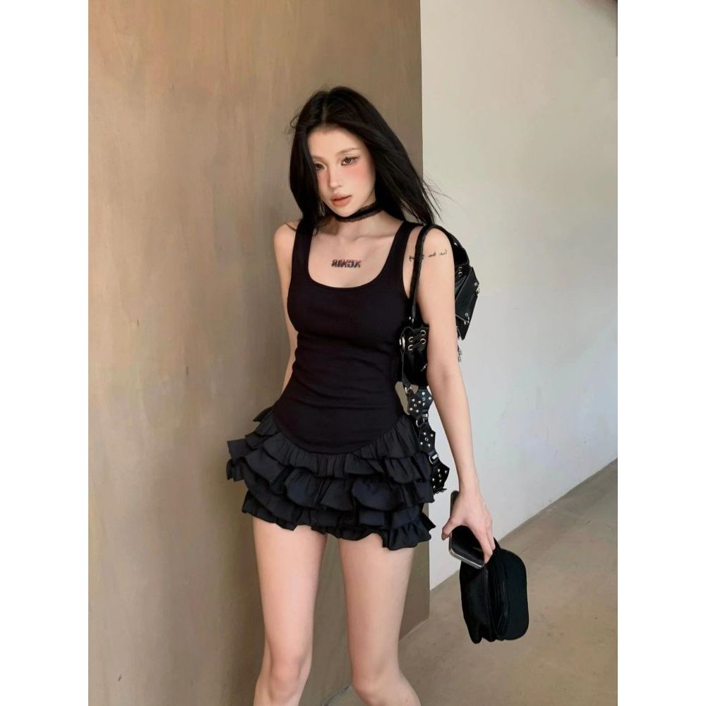 สาวร้อนชุดเดรสสีดําขนาดเล็กหญิงฤดูร้อนแบบใหม่กระโปรงเค้กแขนกุดแคบ-เอวสลิงกระโปรงสั้นกระโปรงดีงาม