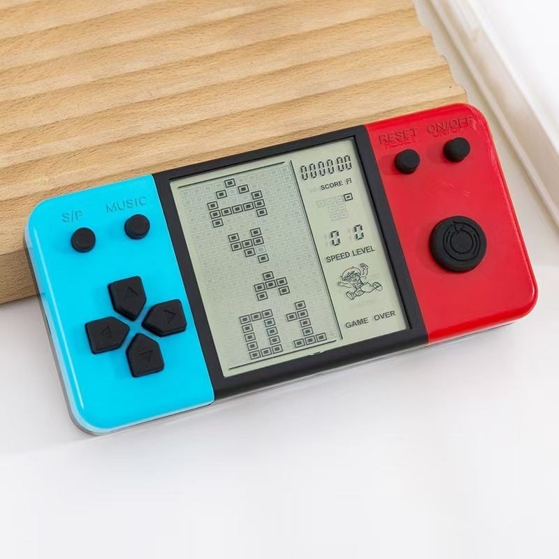 คอนโซลเกม Tetris หน้าจอขนาดใหญ่มือถือมือถือเกม Breakthrough ที่เดินทางมาพักผ่อนสําหรับเด็กปิดเสียง