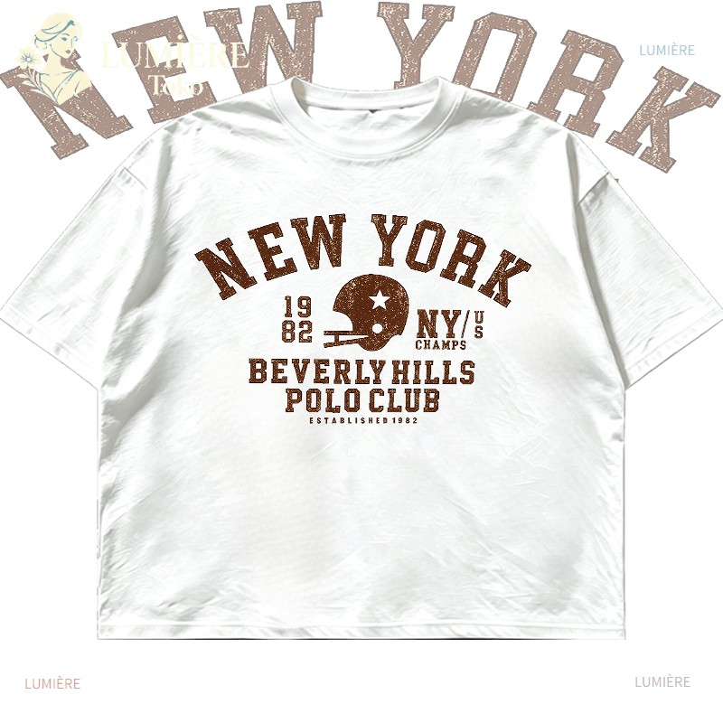 เสื้อยืดแขนสั้น Oversize สําหรับผู้หญิง สีครีม New York Text Motif หมวกกันน็อคฟุตบอลอเมริกัน Beverly