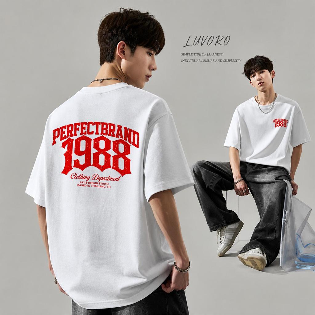 (ผ้าฝ้าย100%) Luvoro 2026 Cotton ย้อนยุค oversize T-shirt เนื้อผ้านุ่มระบายอากาศดี สีดำและสีขาว เสื้อยืดแขนสั้น C2947