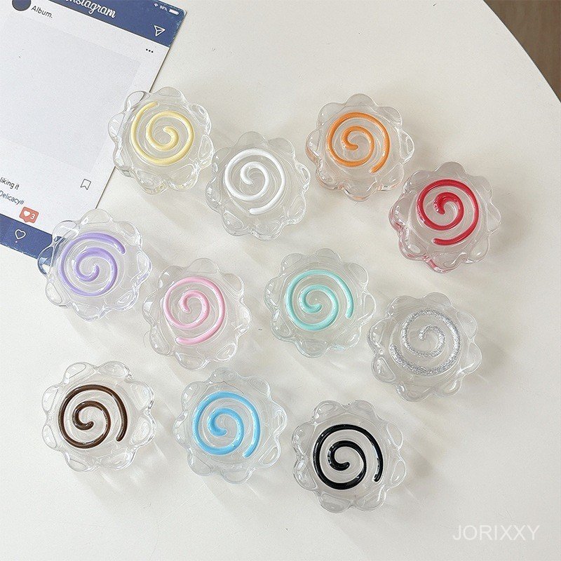 ขนาดเล็กสดผู้หญิงโปร่งใสปลาเค้กที่มีสีสัน กระแสน้ําวน หดสามมิติกาวผู้ถือโทรศัพท์มือถือ