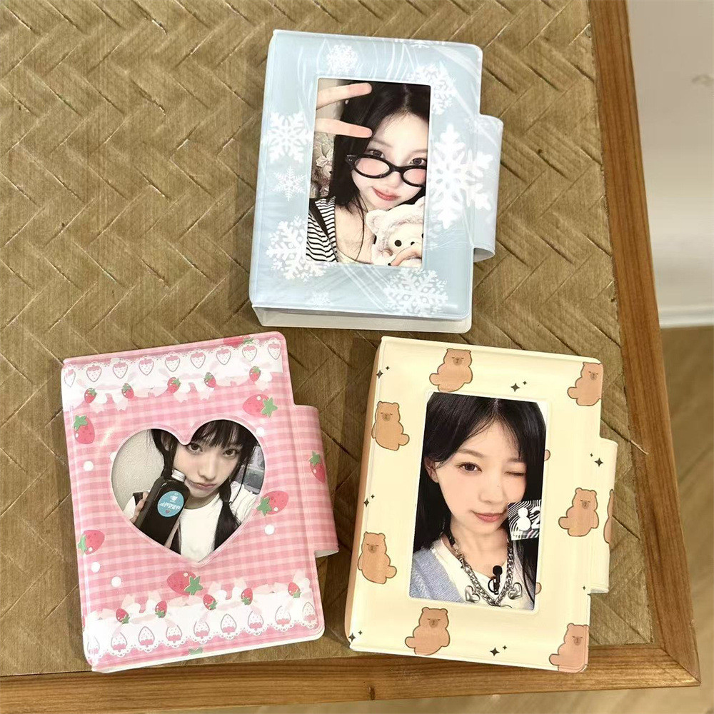 Kapibara สตรอเบอร์รี่เกล็ดหิมะ Yigongge การ์ดหนังสือย้อนกลับหัวเข็มขัด 10 ซม.อัลบั้มรูปโพลารอยด์ Aidou การ์ดผู้ถือ