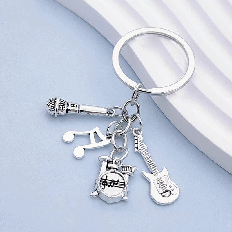 Creative Mini Alloy Cool Punk lnstrument พวงกุญแจไมโครโฟนหมายเหตุกีตาร์กุญแจรถ Charm เทศกาลเครื่องประดับของขวัญ