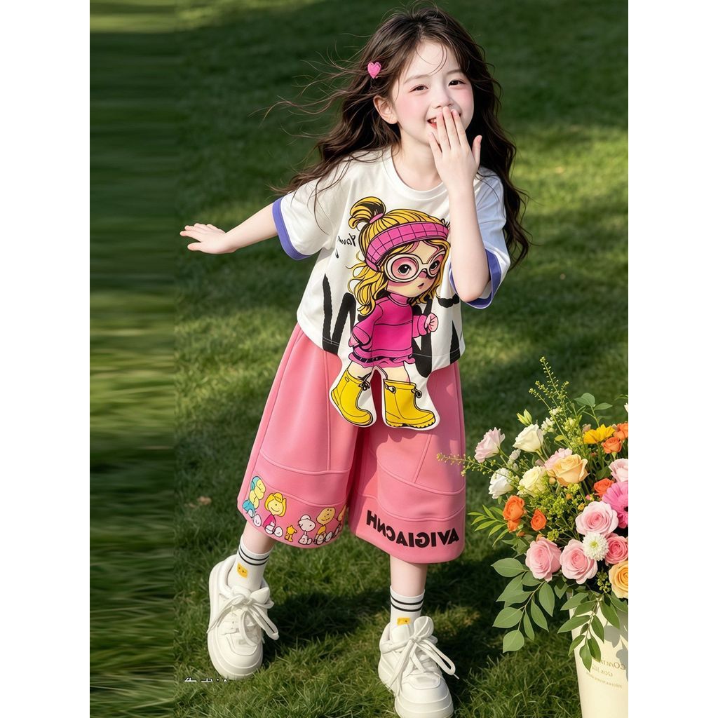 2ชิ้นน่ารักสาวฤดูร้อนชุดสาวการ์ตูนพิมพ์สีบล็อกข้อมือแขนสั้นเสื้อยืดหลวมสีชมพูขากว้างคาปรีกางเกงเด็กสบายๆ เพลย์แวร์ 2026