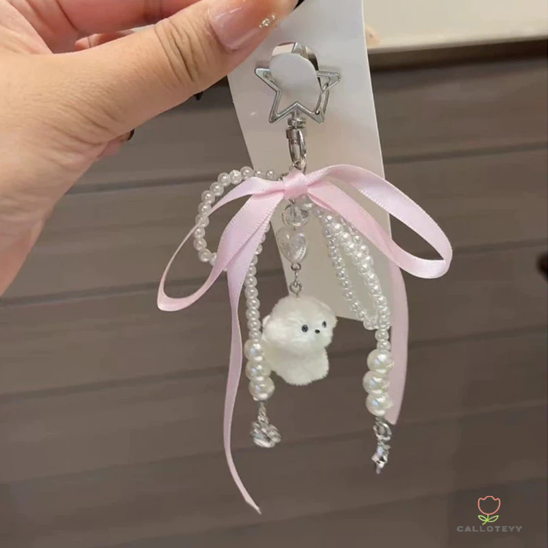 สายคล้องโทรศัพท์Flocking ลูกสุนัขมุกโบว์โทรศัพท์จี้น่ารักอเนกประสงค์โซ่โทรศัพท์พวงกุญแจหวานสายคล้องมือPhone Chain