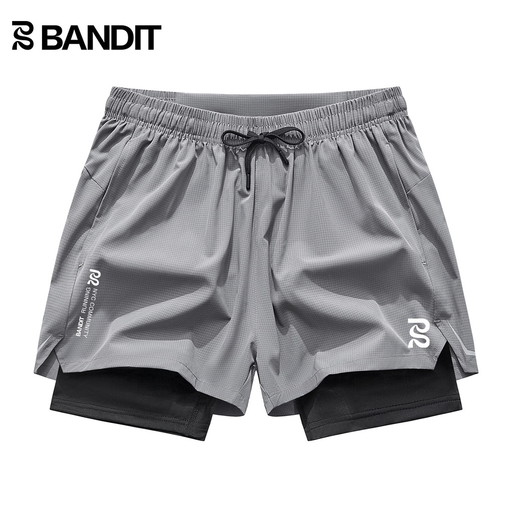 BANDIT RUNNING สามารถถือโทรศัพท์มือถือกีฬาฟิตเนส RUNNING Xiuhe ปลอมสองชิ้น Quick-Drying Quarter ผู้ช