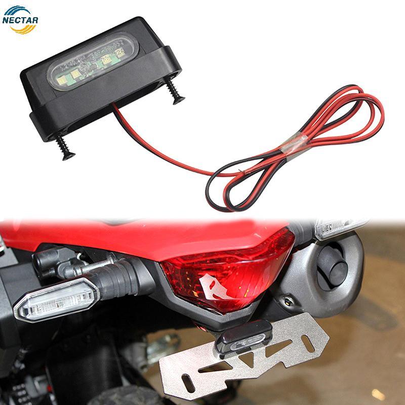 TAR 12V Universal รถจักรยานยนต์ 4LED ไฟส่องป้ายทะเบียน 0.2W ไฟป้ายทะเบียนด้านหลังพร้อม Emark N