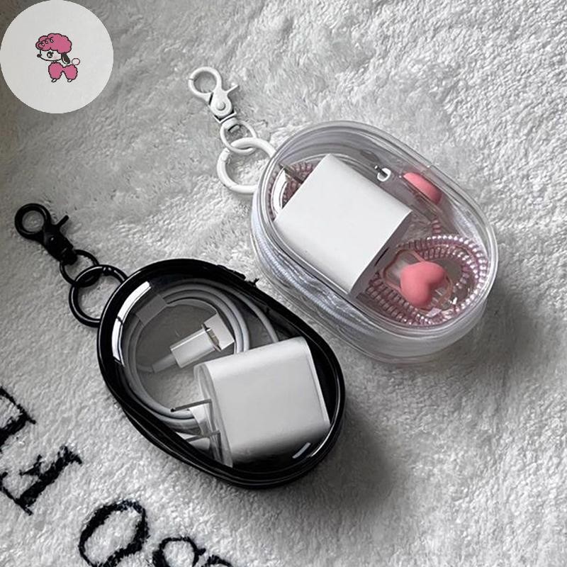 GRL สีดําสีขาวรูปไข่ PVC โปร่งใสกระเป๋าเครื่องสําอางตุ๊กตากระเป๋าแบบพกพาหูฟังเหรียญข้อมูลสาย Charger