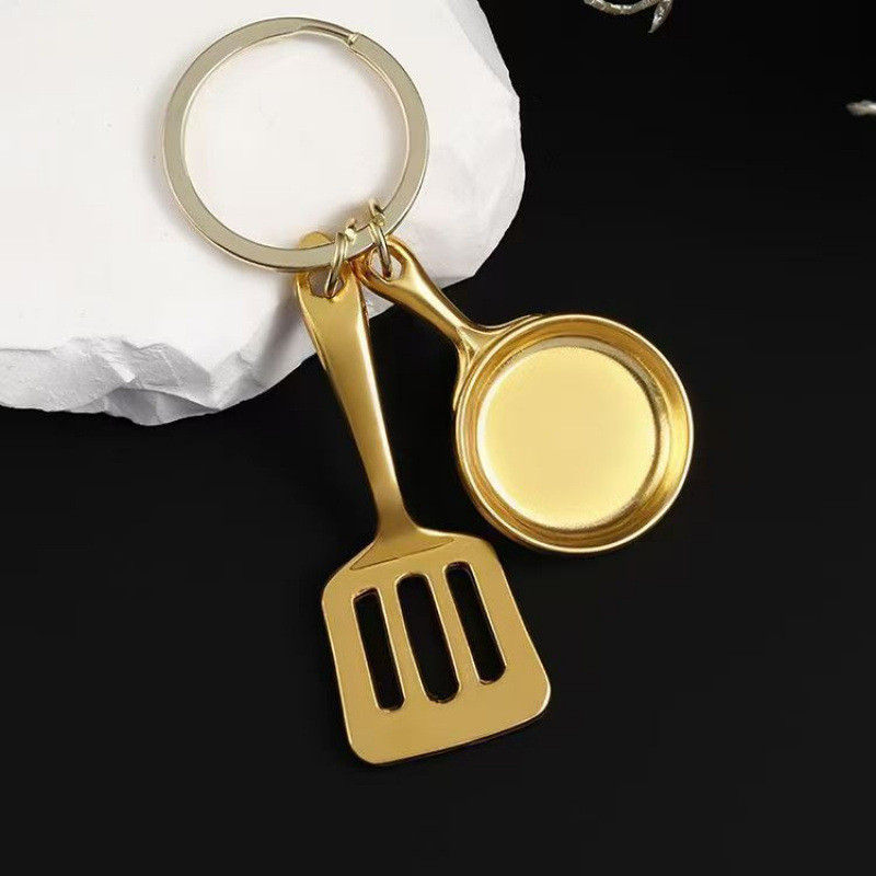 พวงกุญแจจี้ของขวัญคู่โลหะจีนของขวัญอุปกรณ์เสริมวันเกิด High-End Alloy Golden Spatula Pan 2025.10.25