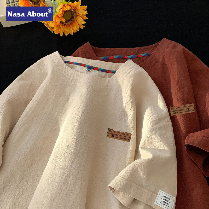 เสื้อยืดแขนครึ่งผู้ชาย NAZA จากผ้าฝ้ายลินินผ้าไหมน้ำแข็ง ทรงหลวม สไตล์อเมริกัน