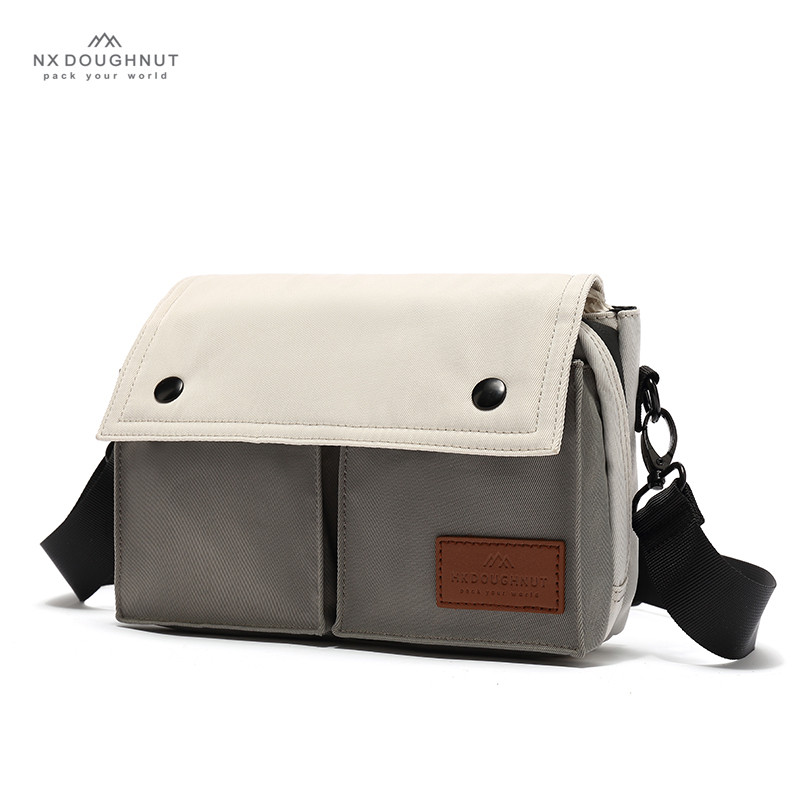NX Donut ของแท้ Donut Messenger กระเป๋าสะพายเวอร์ชั่นเกาหลีผ้าใบกระเป๋า Multi-Compartment กีฬาผู้ชาย