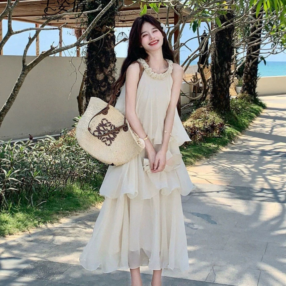 ฝรั่งเศสที่สวยงามเชือกแขวนคอชุดสลิงหญิงขนาดเล็กริมทะเลวันหยุดที่ดีงามกระโปรงยาว2026.8.16
