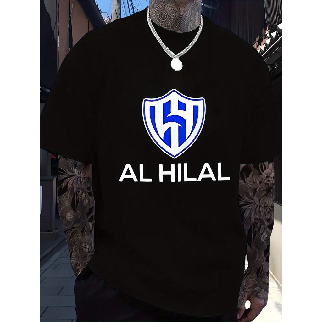 เสื้อยืดผู้ชายพิมพ์ลาย AL HILAL สวมใส่สบายคอกลมฤดูร้อน