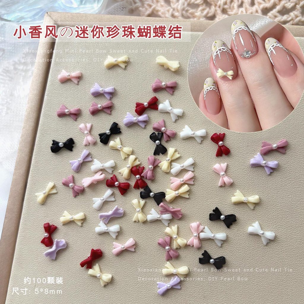 ประมาณ 100 ถุง French Dot Pearl Bow Nail Art อุปกรณ์เสริมผสมสีสามมิติสีดําสีขาวเรซิ่น Bow Tie diy สวมใส่เล็บเพชรอุปกรณ์เสริม