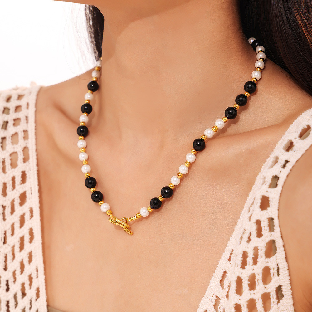 สร้อยคอแฟชั่นสไตล์ OT ต่างหูและสร้อยคอมากกว่า 1 สไตล์ ทำจากไทเทเนียมและเหล็ก เพิ่มความหรูหราให้คอลเล